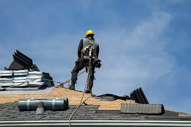 Professional Roof Replacement technician working in Eliot, ME